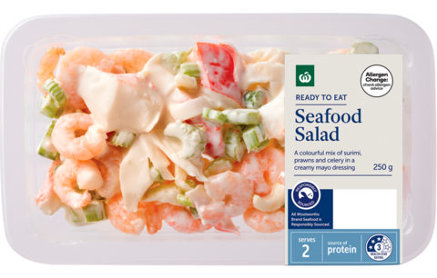 A plastic container food package labelled Seafood Salad