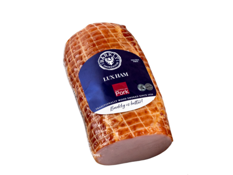 Ham in clear vacuum sealed packaging with a blue label reading 'Lux Ham'