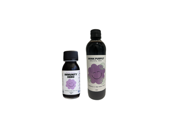 A glass bottle labelled Drink Purple 60ml and 350ml 